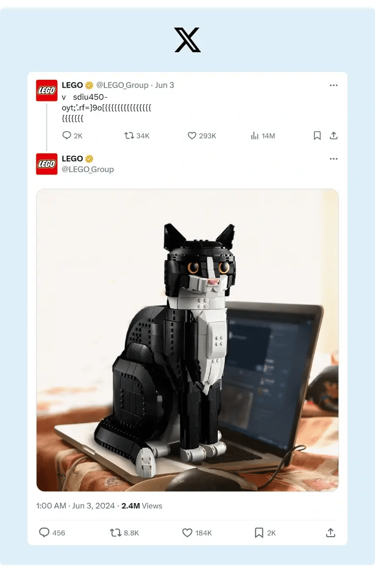 A funny picture of a Lego cat sitting in a laptop keyboard