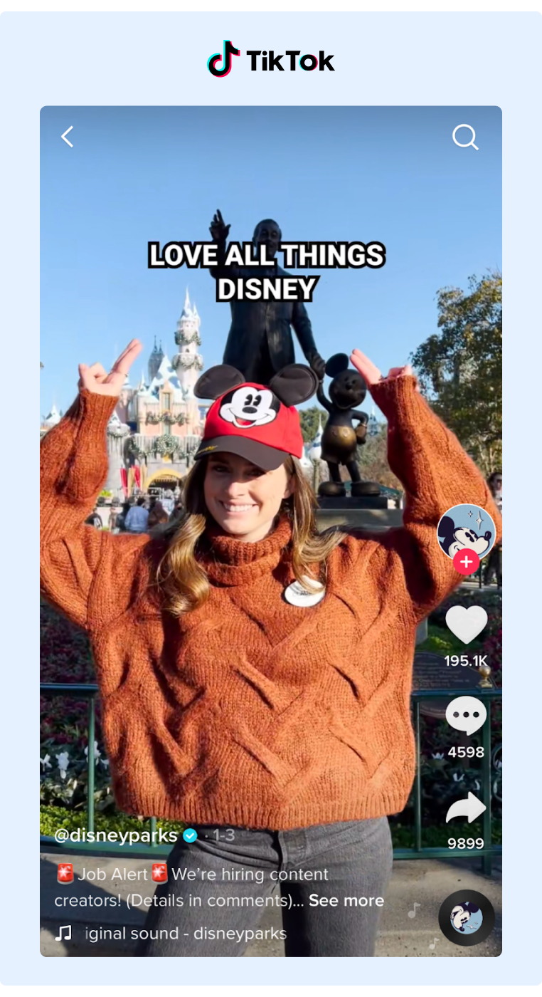 Video Engagement - Disney using their TikTok account to recruit for their open positions with a young woman standing in front of the castle with Mickey ears on